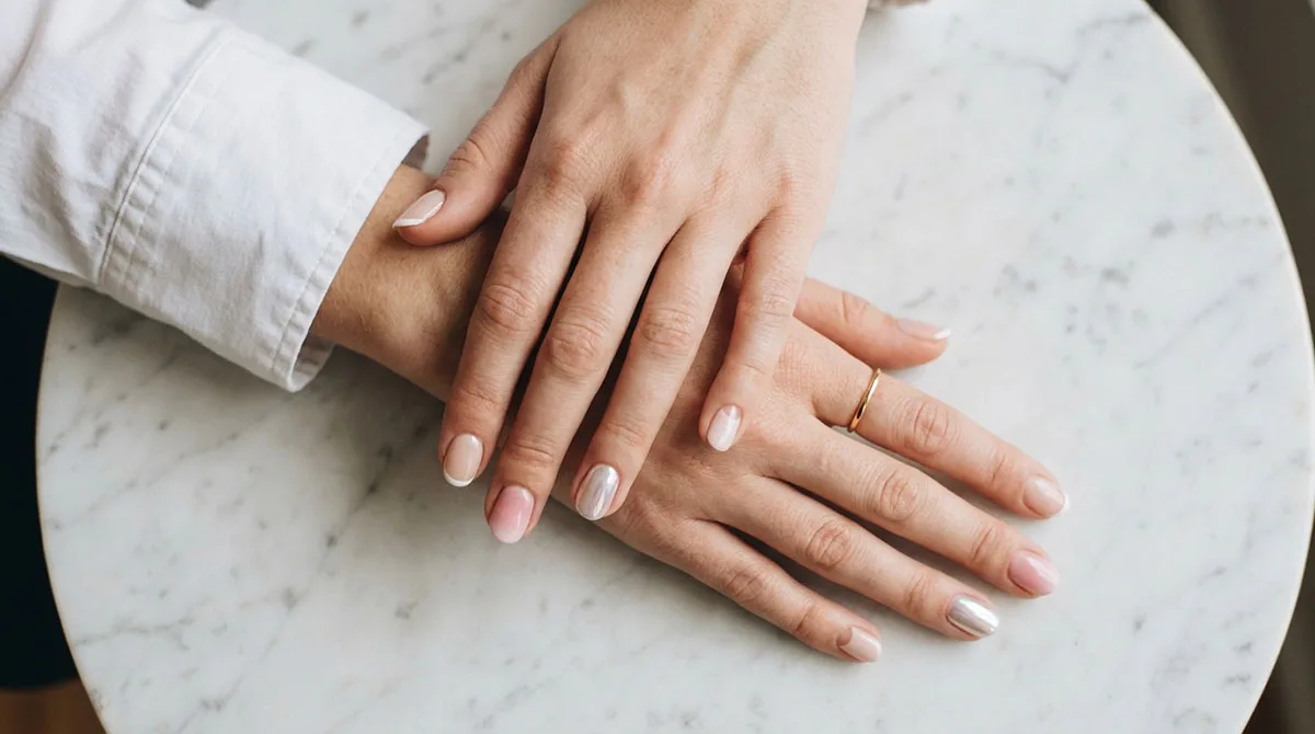 Classy short nail designs on short squoval nails including French tip, milky nude, chrome, ombre, and negative space manicures