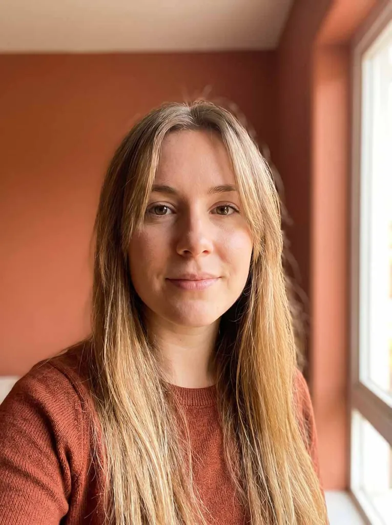 curtain bangs with long open hair — center part face-framing portrait
