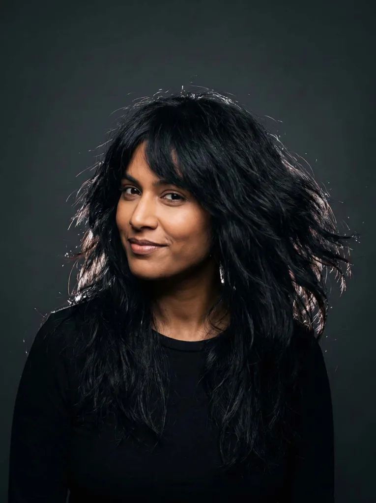 textured shag haircut on long hair — layers in motion showing razor-cut texture