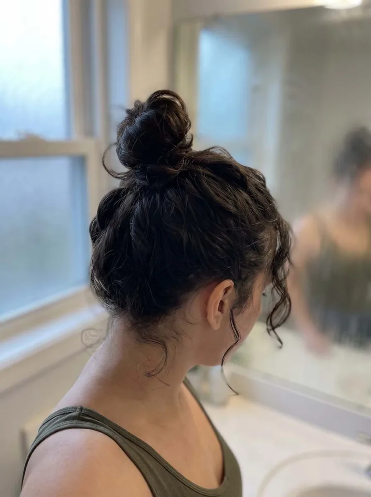 twisted top knot hairstyle on wavy hair quick 4-minute updo