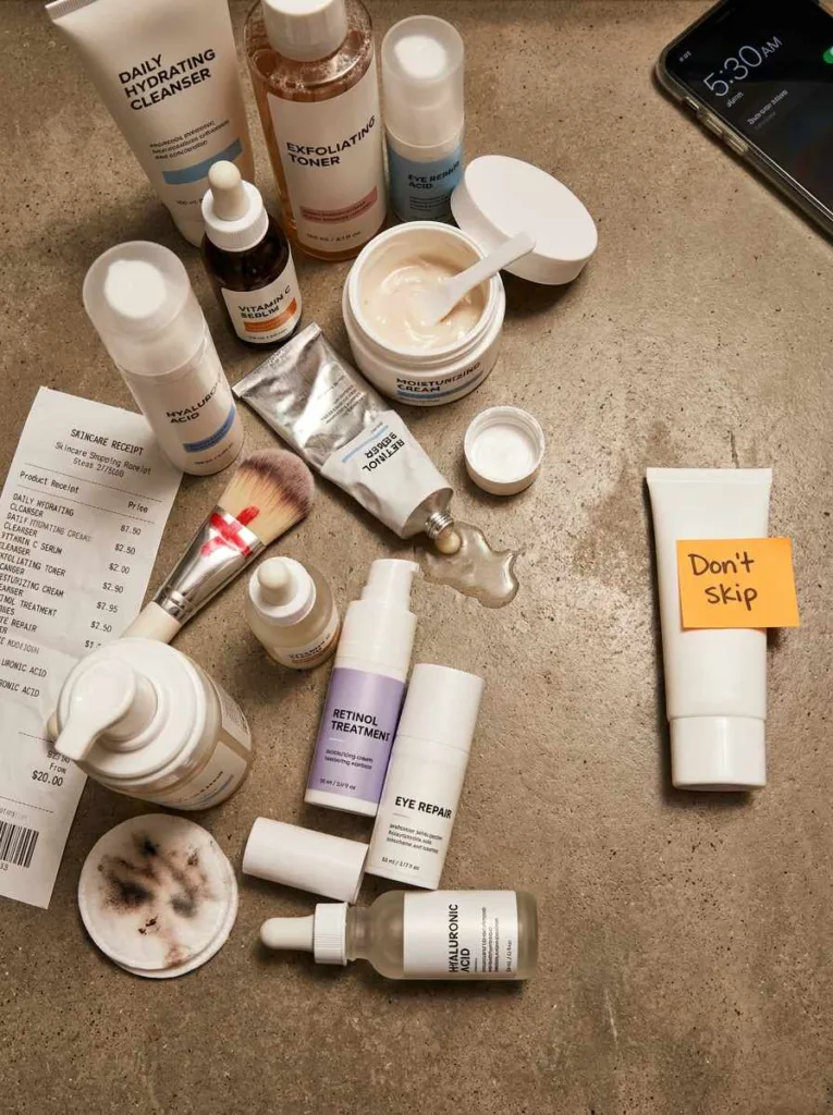 Overcrowded bathroom counter with too many skincare products and a sunscreen bottle separated with sticky note — skincare mistakes beginners make