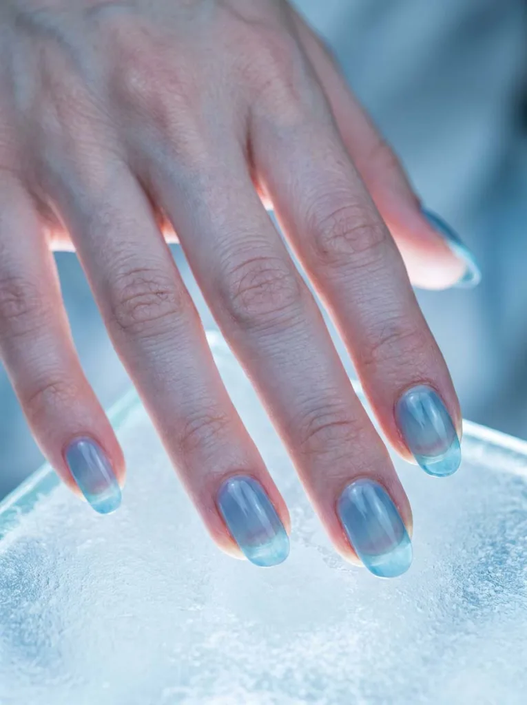Ice blue jelly winter nails with translucent glassy finish