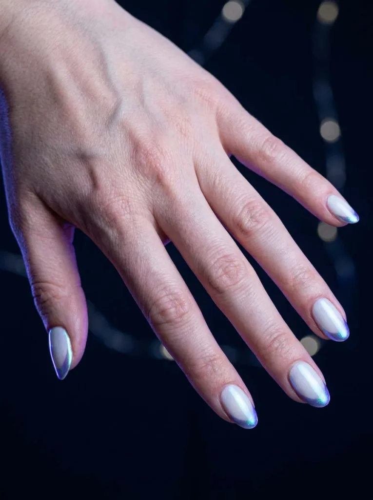 Iridescent aurora winter nails with color-shifting northern lights effect