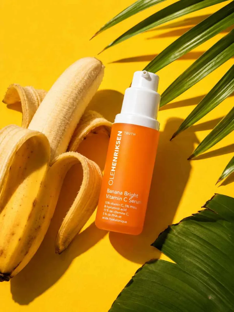 Ole Henriksen Banana Bright Vitamin C Serum bottle with banana and leaves