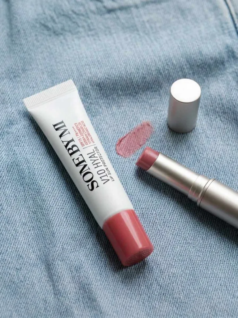 Some By Mi V10 Hyal Lip Sun Protector SPF15 next to a tinted balm for layering