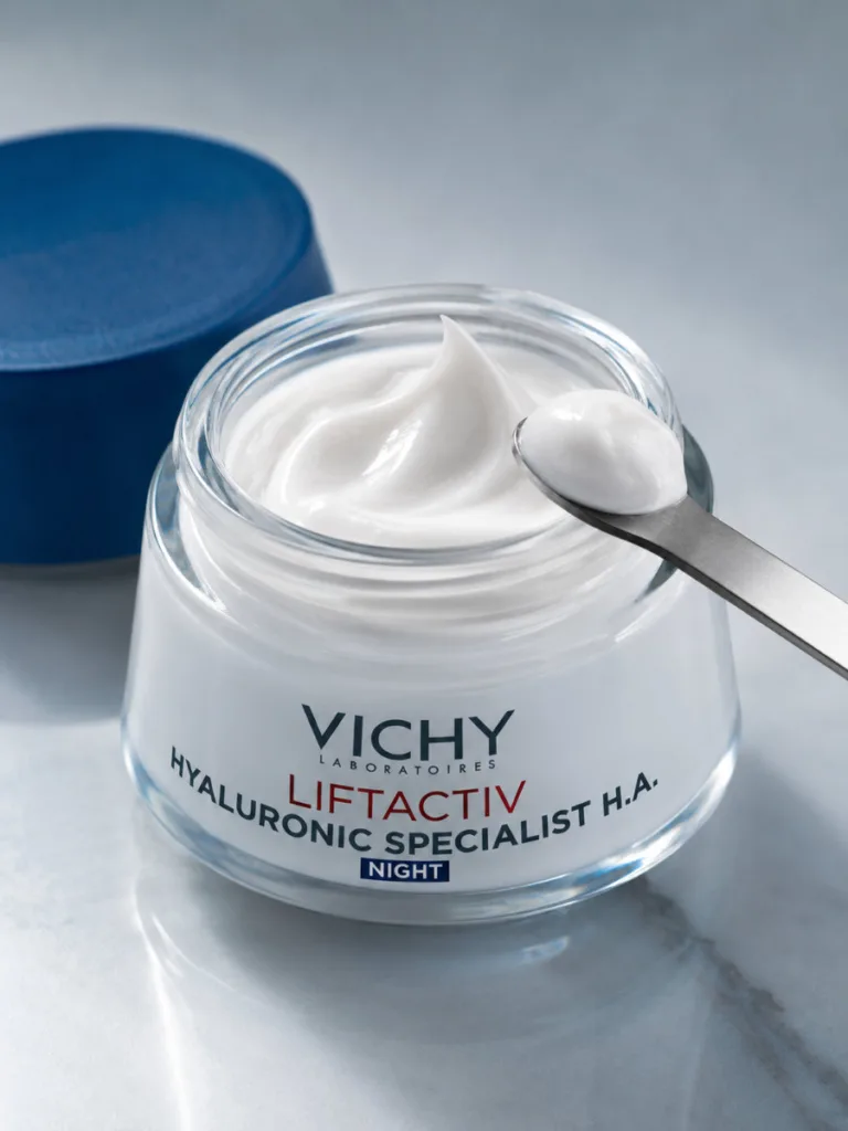 Vichy LiftActiv Supreme turquoise cream jar open with cream swirled on a spatula