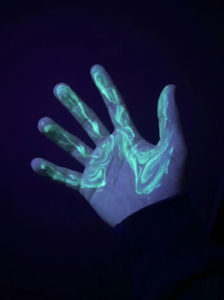 Glow in the dark neon nail design under blacklight