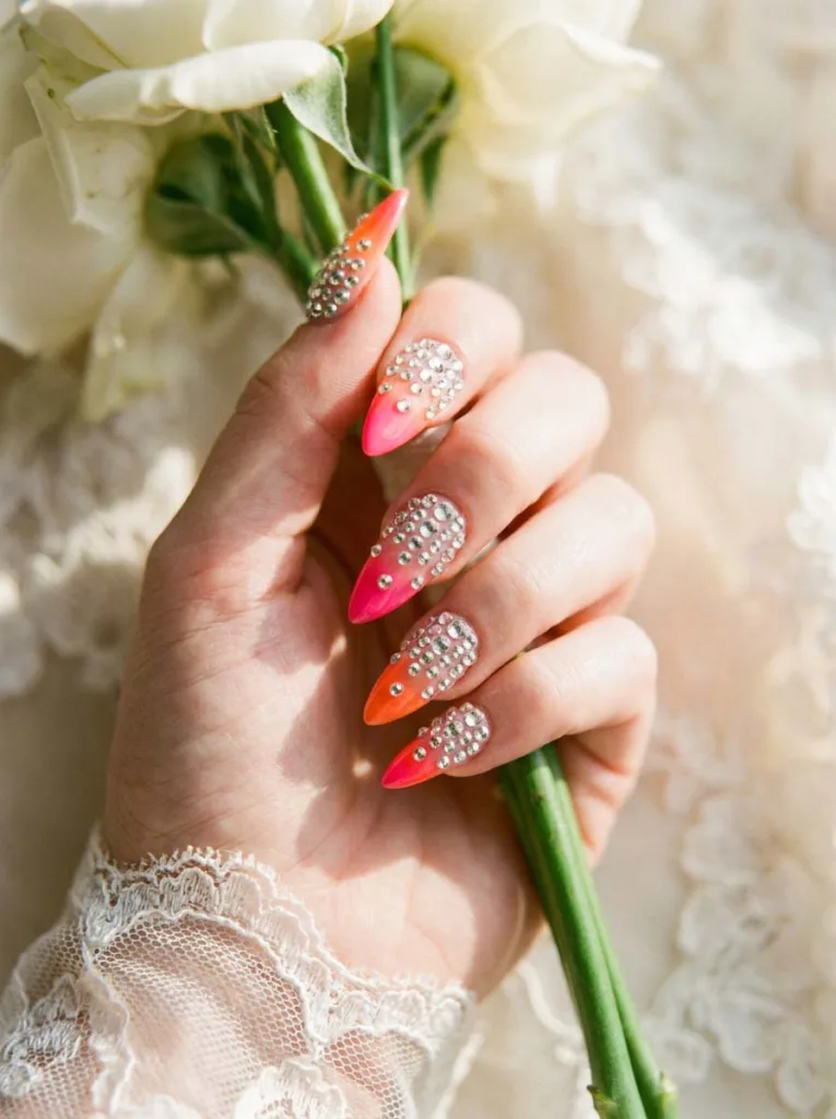 Neon rhinestone French tip nail design for a wedding look