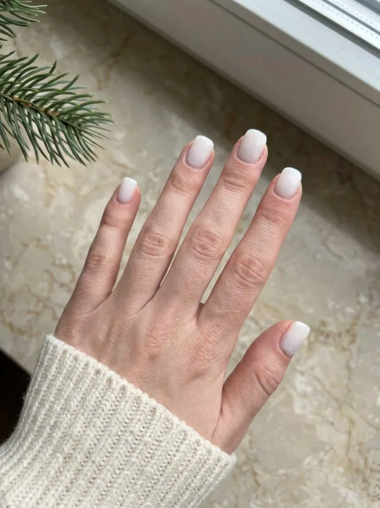 Solid milky white manicure on short square nails, a simple white Christmas nails idea
