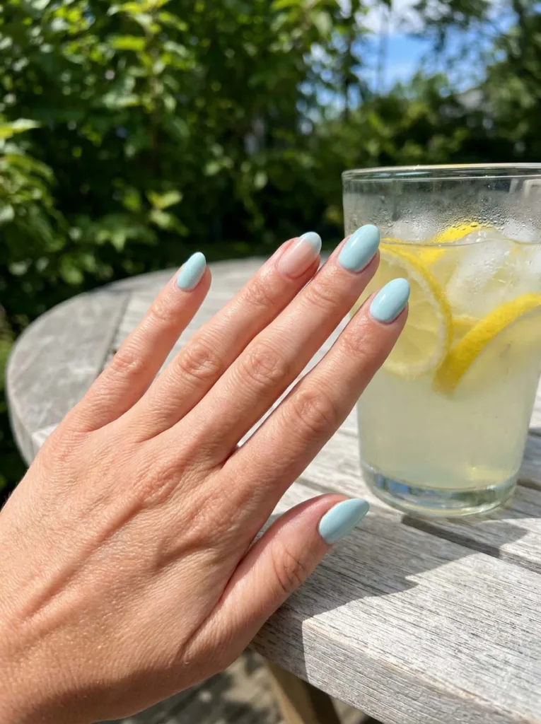 Aquamarine blue birthstone birthday nails outdoors