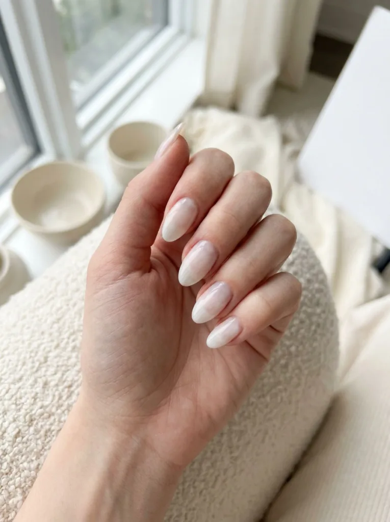 Cloud Dancer milky white new years nails close-up