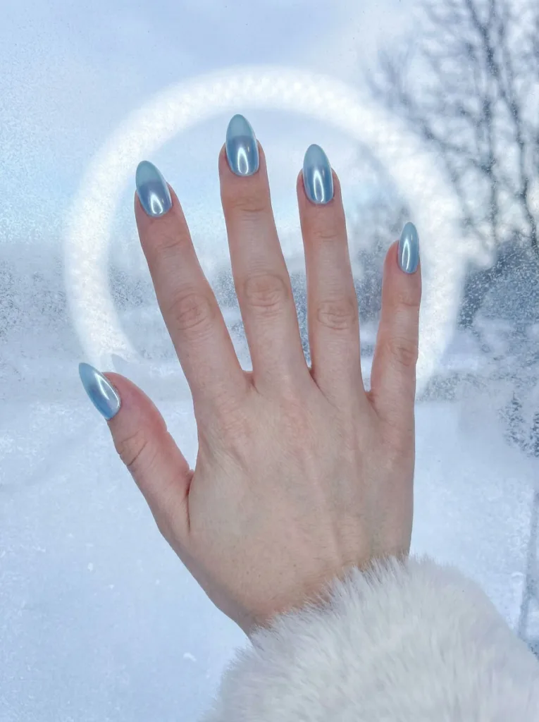 Icy blue chrome manicure with a mirror frost finish