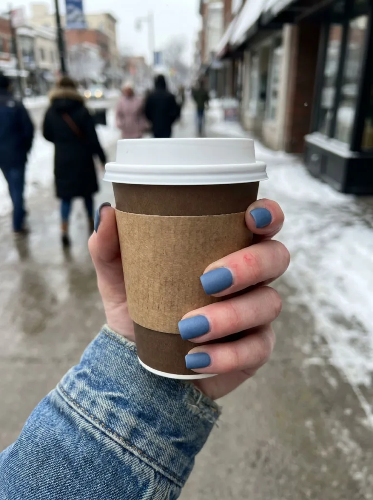 Matte denim blue winter nails in a casual everyday look